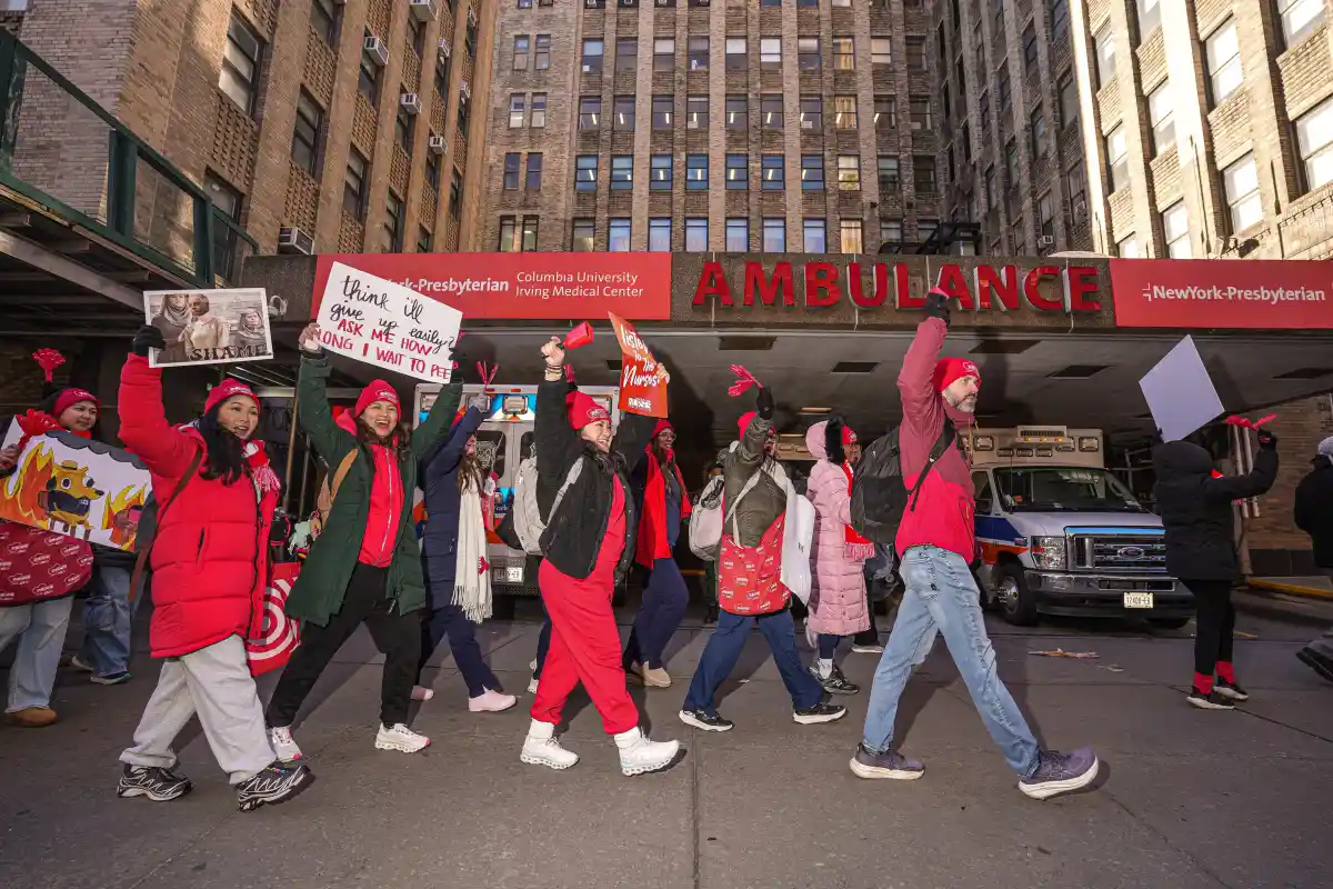 “We do it for the patients”: thousands of striking nurses take to the streets of Manhattan