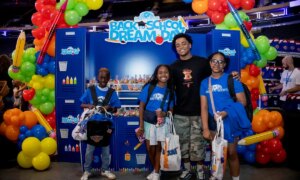 “Back-To-School Dream Day”: 350 children receive school supplies and pose with the Knicks trophy at Madison Square Garden