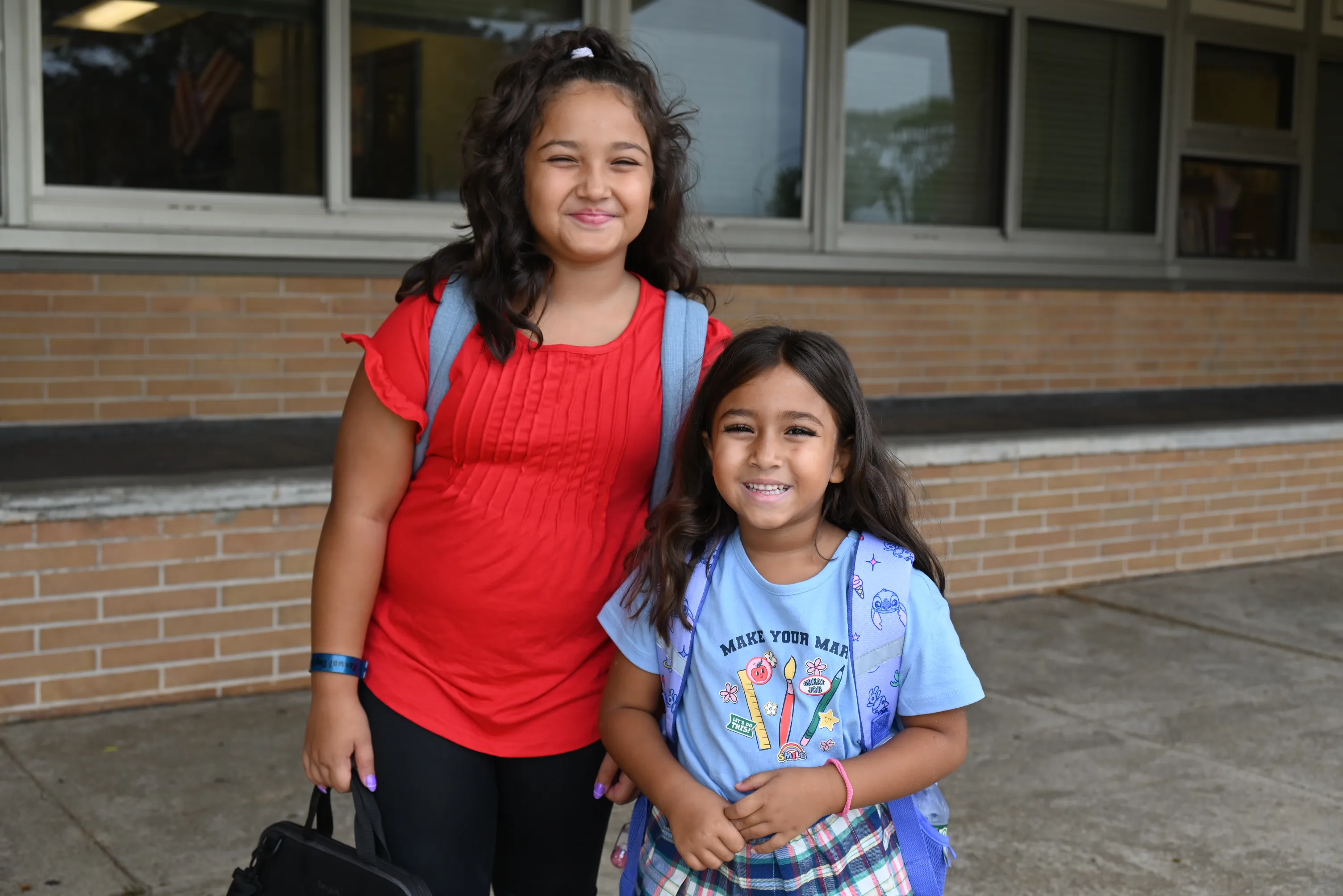 Smiles and excitement at the start of the new school year in Copiague schools
